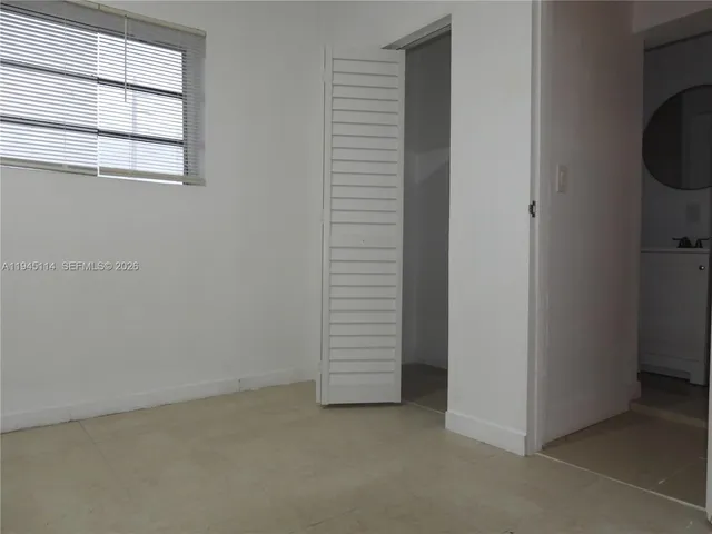 a view of hallway with shower