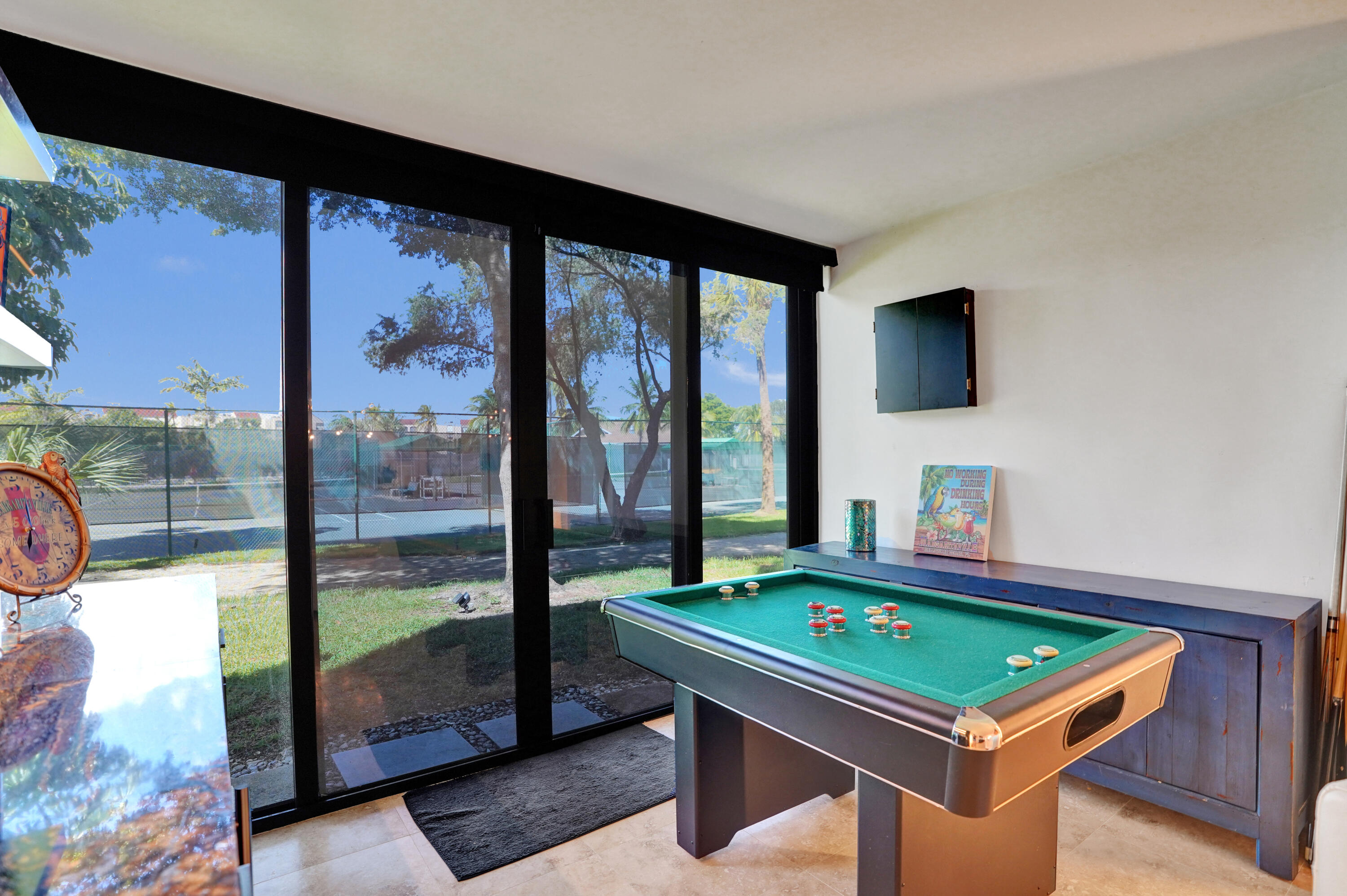 755 Dotterel Road, Unit 1112 Delray Beach, FL 33444 - Photo 13 of 59 a room with pool table and windows