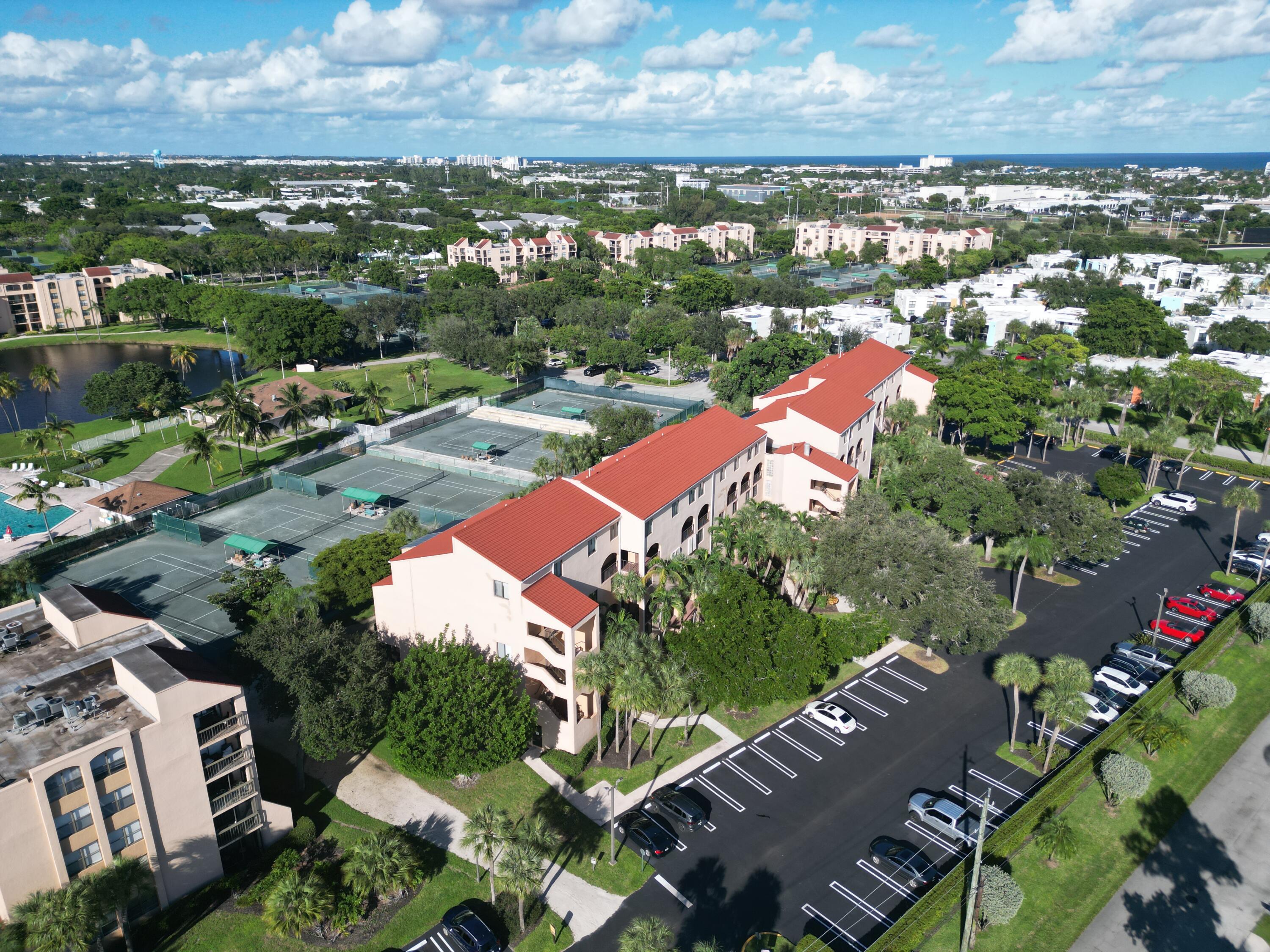 755 Dotterel Road, Unit 1112 Delray Beach, FL 33444 - Photo 51 of 59 an aerial view of residential houses with outdoor space and river
