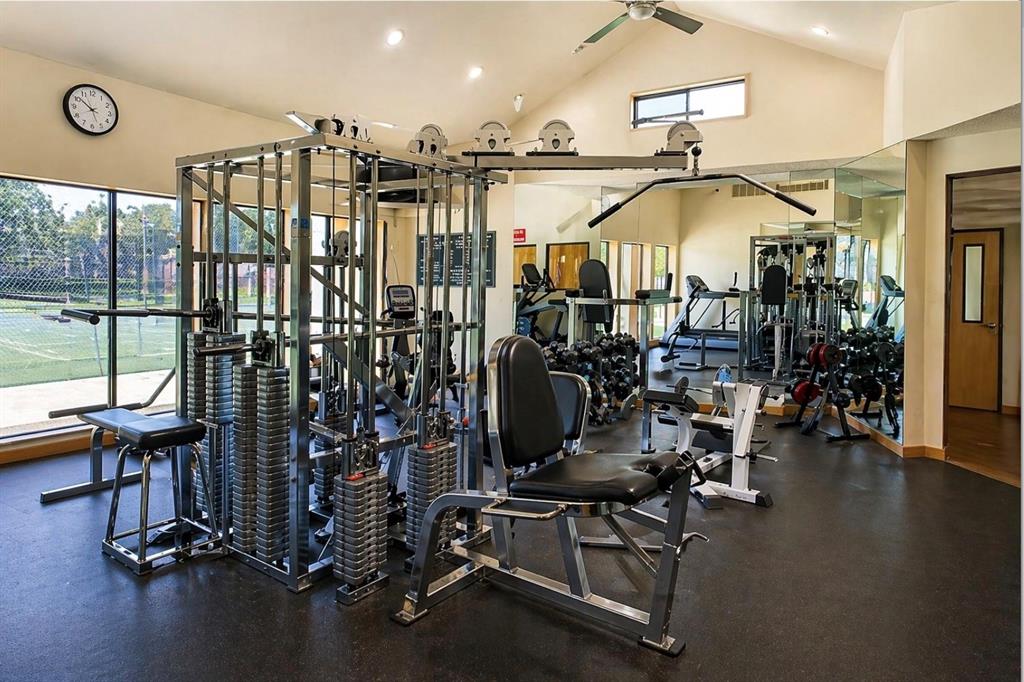 4345 Timberglen Road Dallas, TX 75287 - Photo 25 of 26 a view of a room with gym equipment