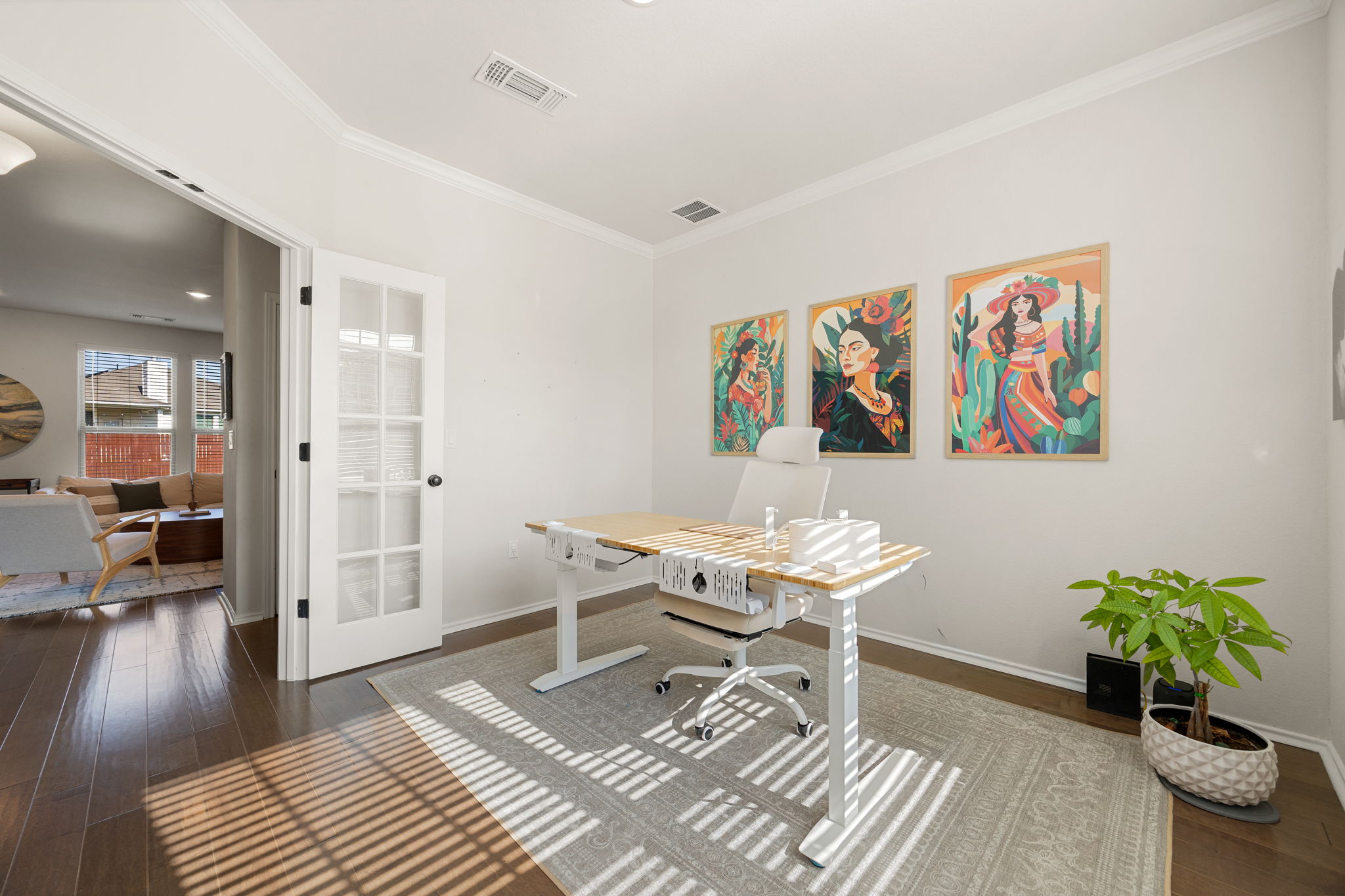 6808 Ellsworth Walk Austin, TX 78724 - Photo 16 of 40 a work room with furniture and a potted plant