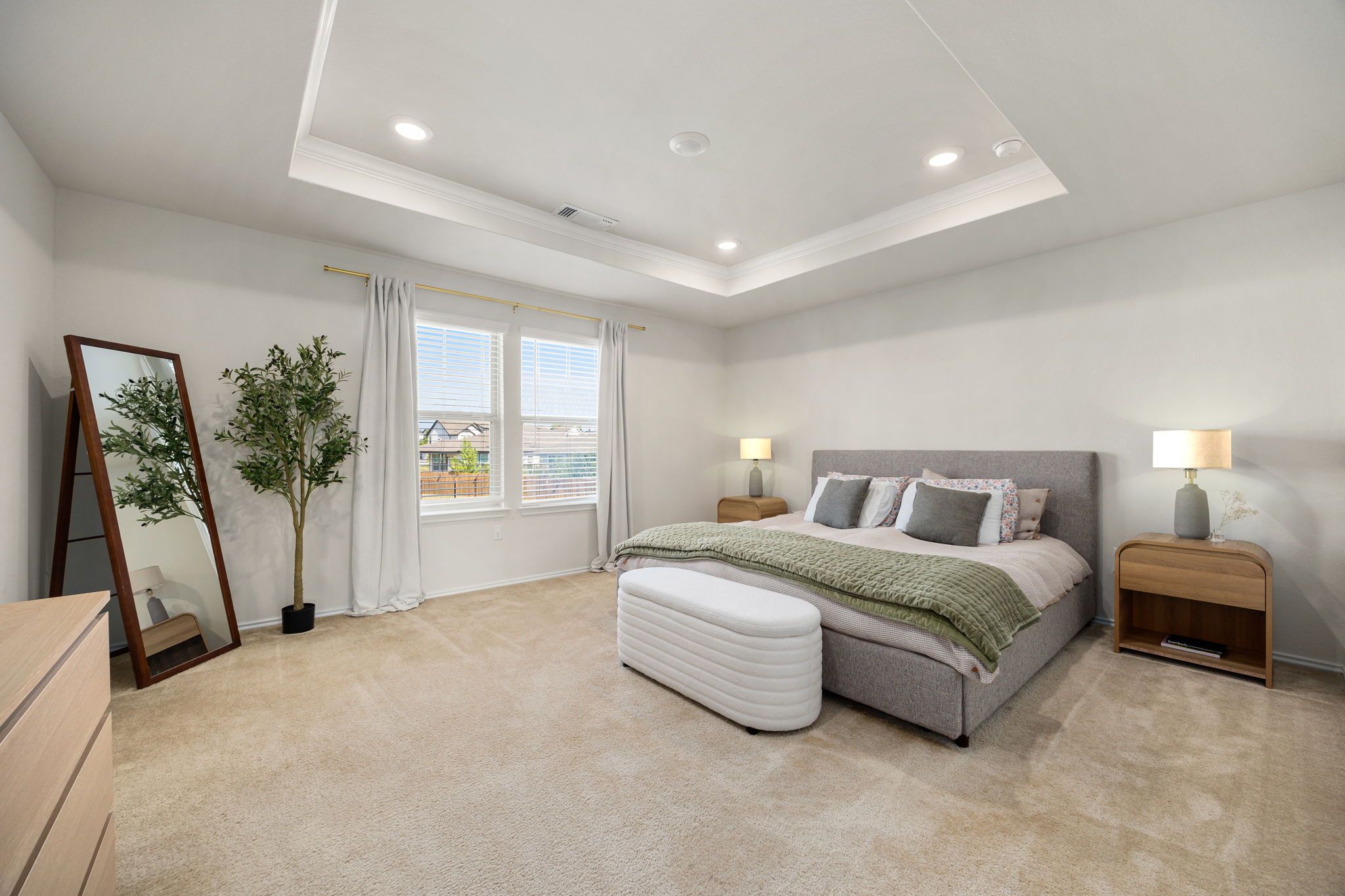 6808 Ellsworth Walk Austin, TX 78724 - Photo 17 of 40 a spacious bedroom with a large bed and a large window