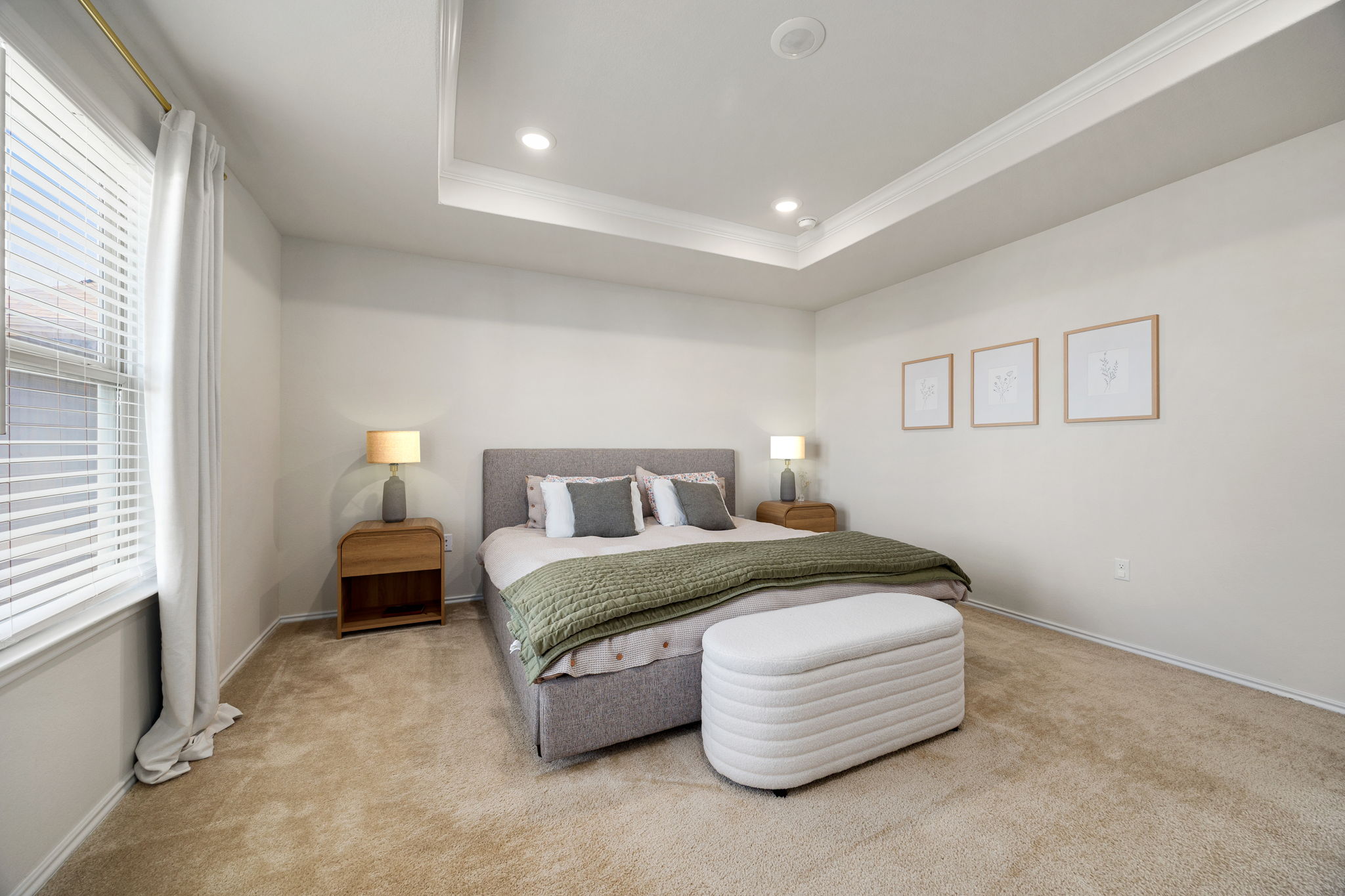 6808 Ellsworth Walk Austin, TX 78724 - Photo 18 of 40 a spacious bedroom with a bed and a couch