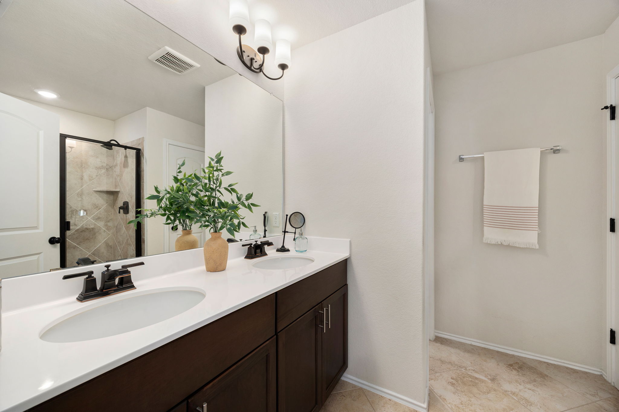 6808 Ellsworth Walk Austin, TX 78724 - Photo 20 of 40 a bathroom with a sink and a mirror