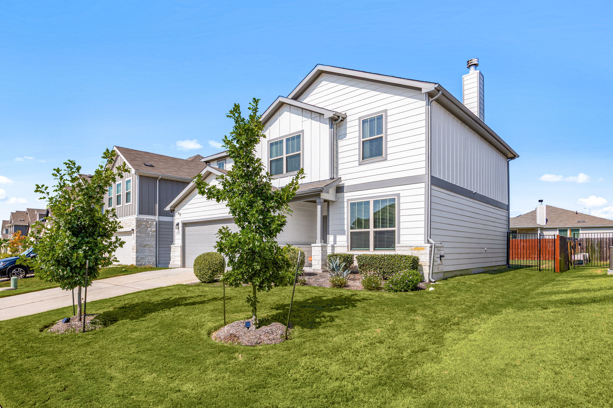 6808 Ellsworth Walk Austin, TX 78724 - Photo 2 of 40 a house view with a garden space