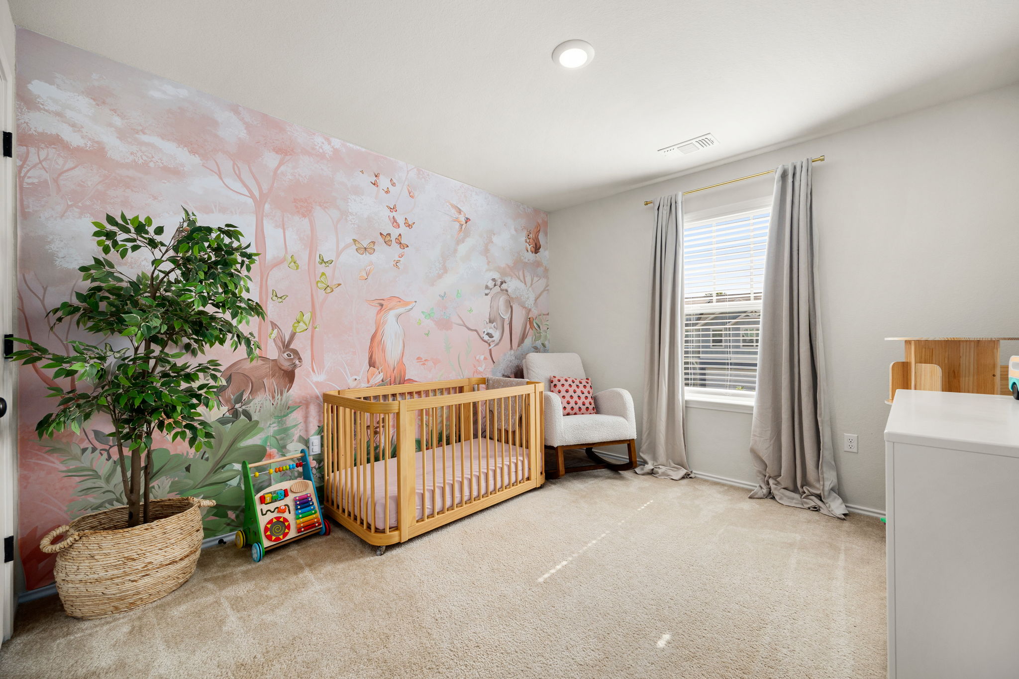 6808 Ellsworth Walk Austin, TX 78724 - Photo 26 of 40 a bedroom with furniture and a couch