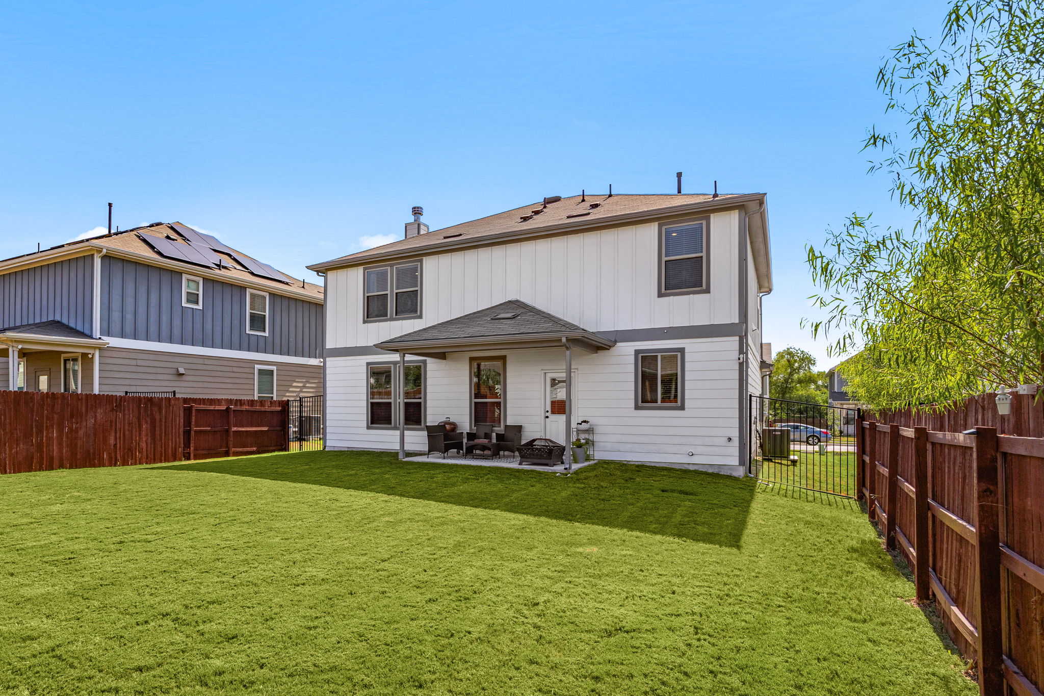 6808 Ellsworth Walk Austin, TX 78724 - Photo 30 of 40 a view of a house with a big yard plants and large trees