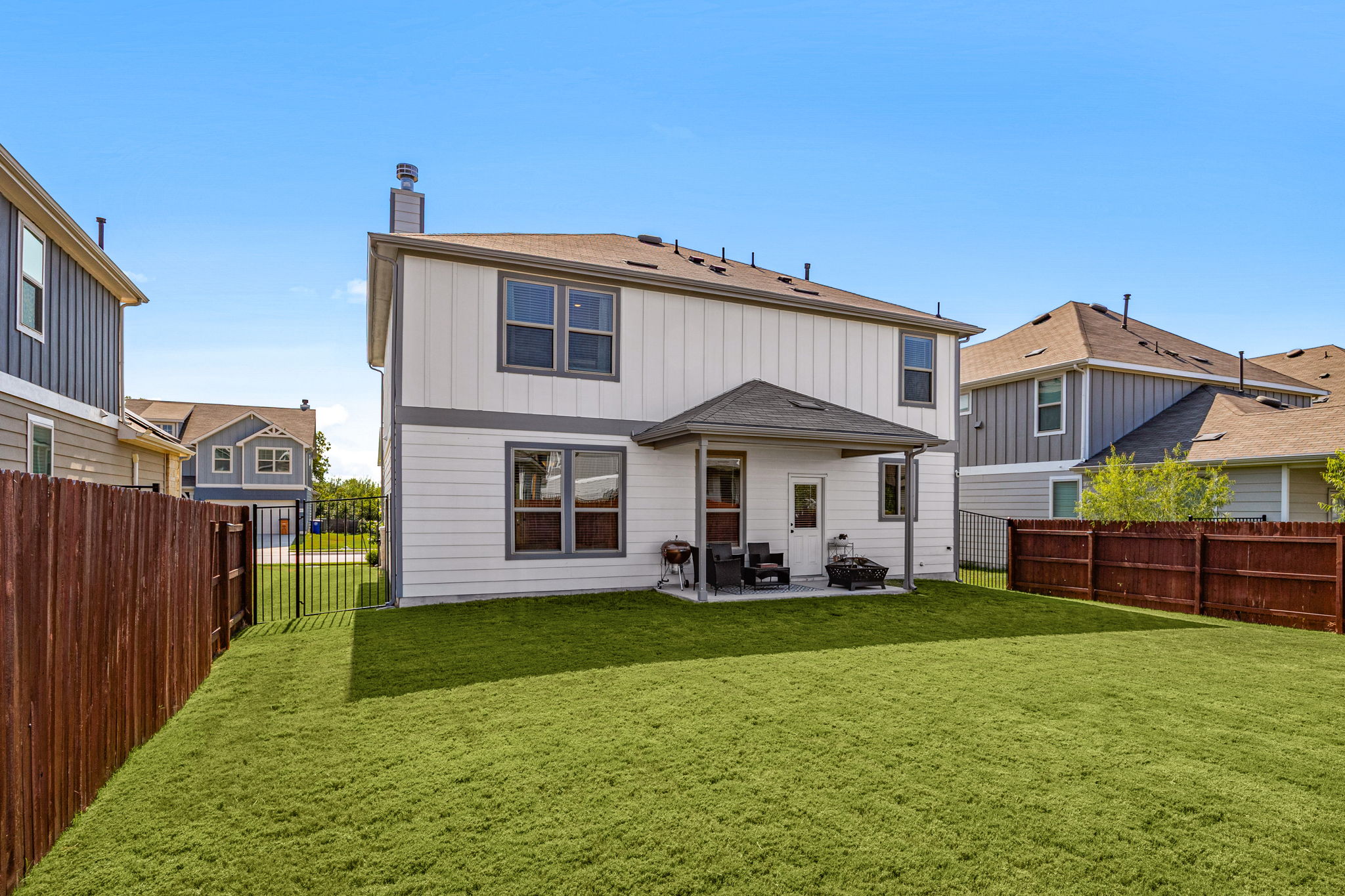 6808 Ellsworth Walk Austin, TX 78724 - Photo 31 of 40 a front view of a house with a yard