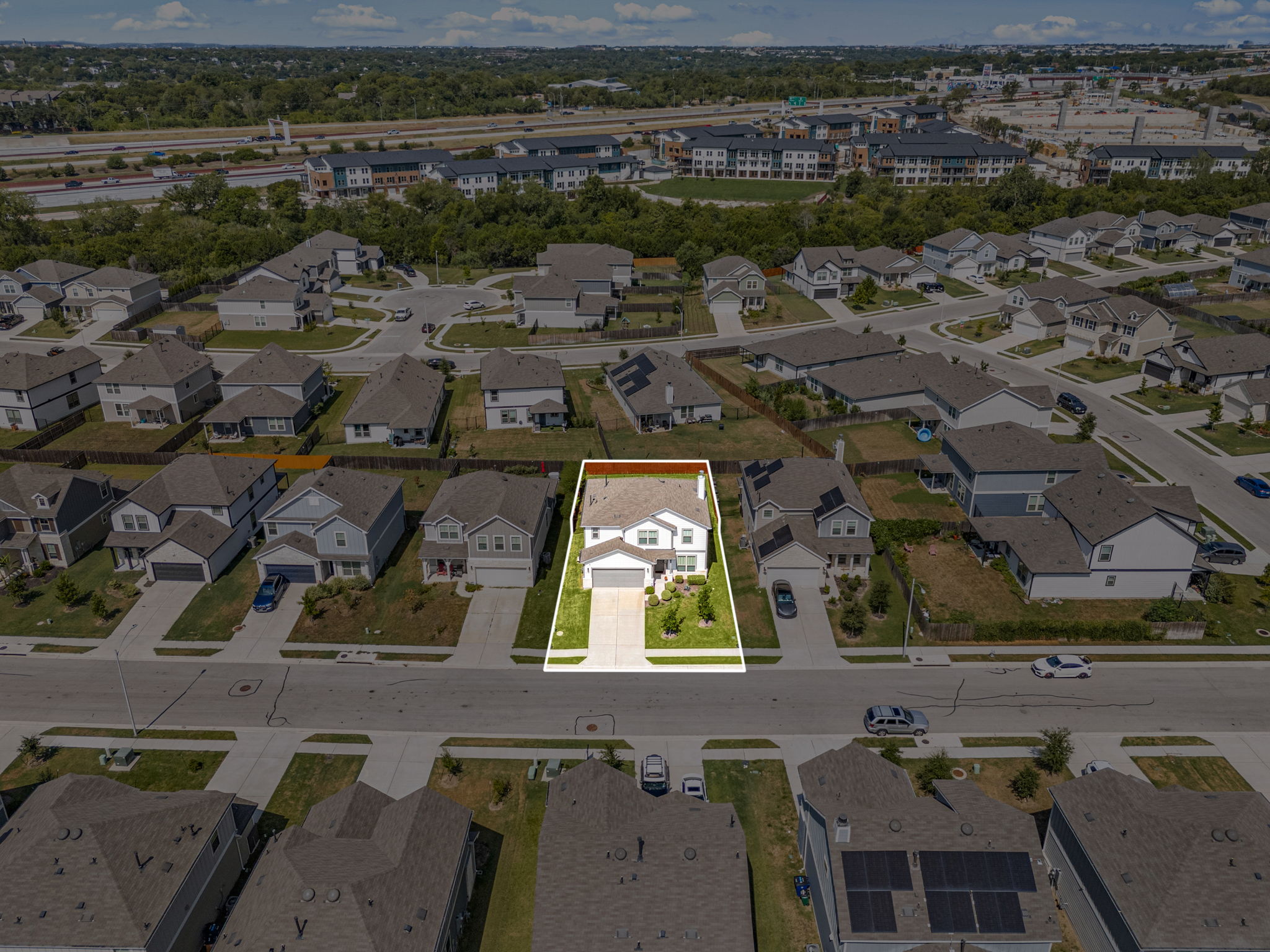 6808 Ellsworth Walk Austin, TX 78724 - Photo 39 of 40 an aerial view of a house with a lake view