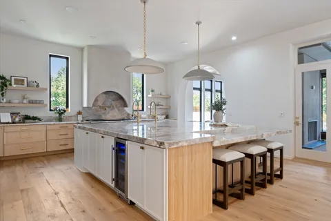 a bedroom with a large bed and a couch