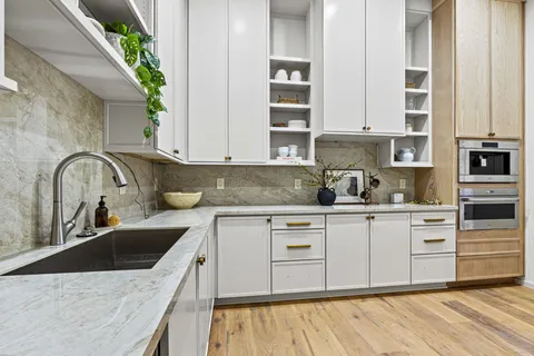 a view of a hallway with windows