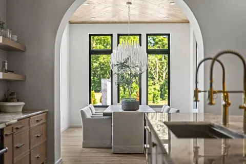 a bathroom with a sink and a window