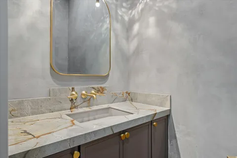 a living room with furniture a table and a large window