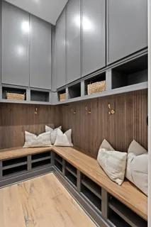 a front view of a house with swimming pool having outdoor seating