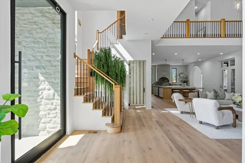 an aerial view of a house with outdoor space