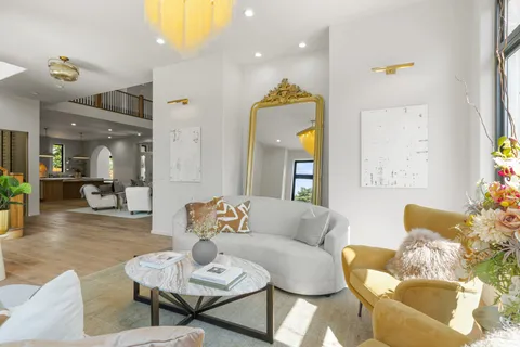 a kitchen with a table and chairs in it