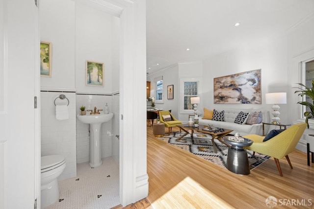 a living room with furniture and a table