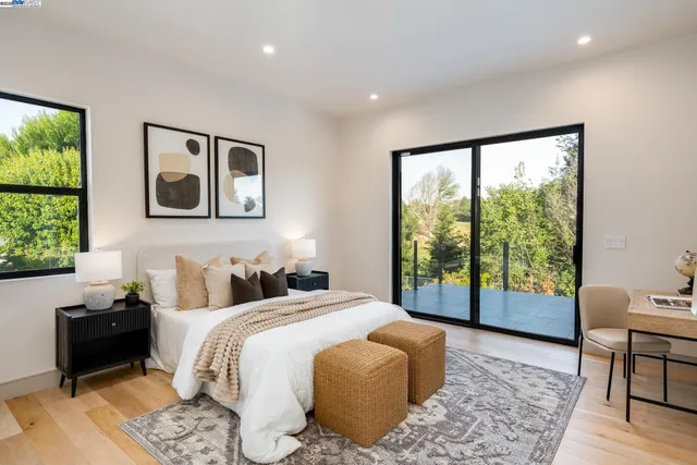 a bathroom with a sink mirror toilet and shower
