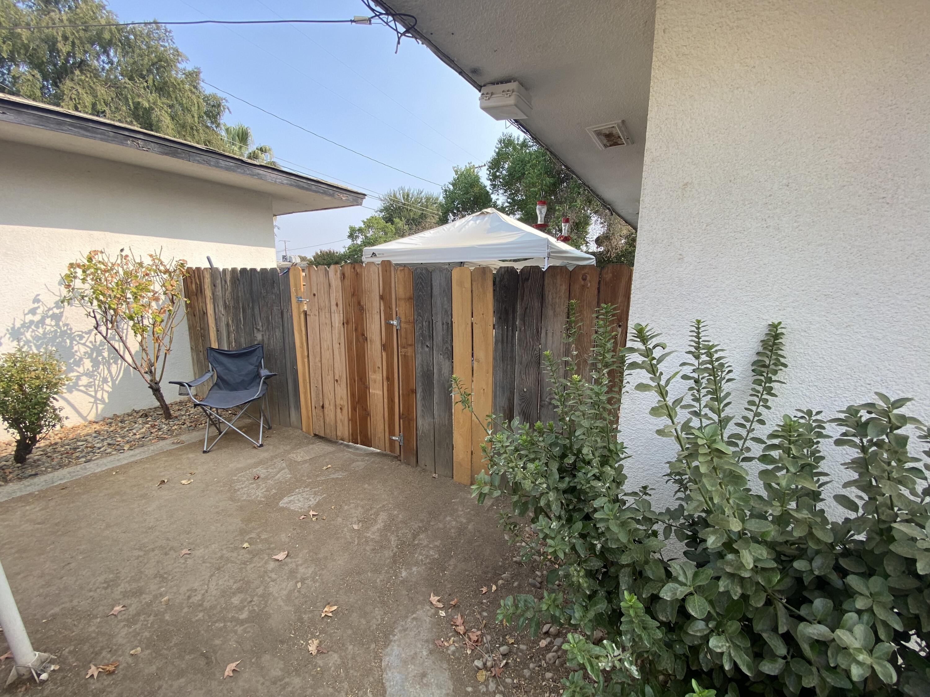 405 Channing Way Exeter, CA 93221 - Photo 47 of 49 side yard gate