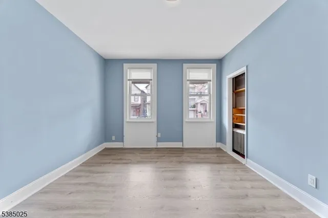 an empty room with windows