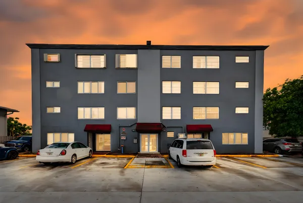 a car parked in front of a building