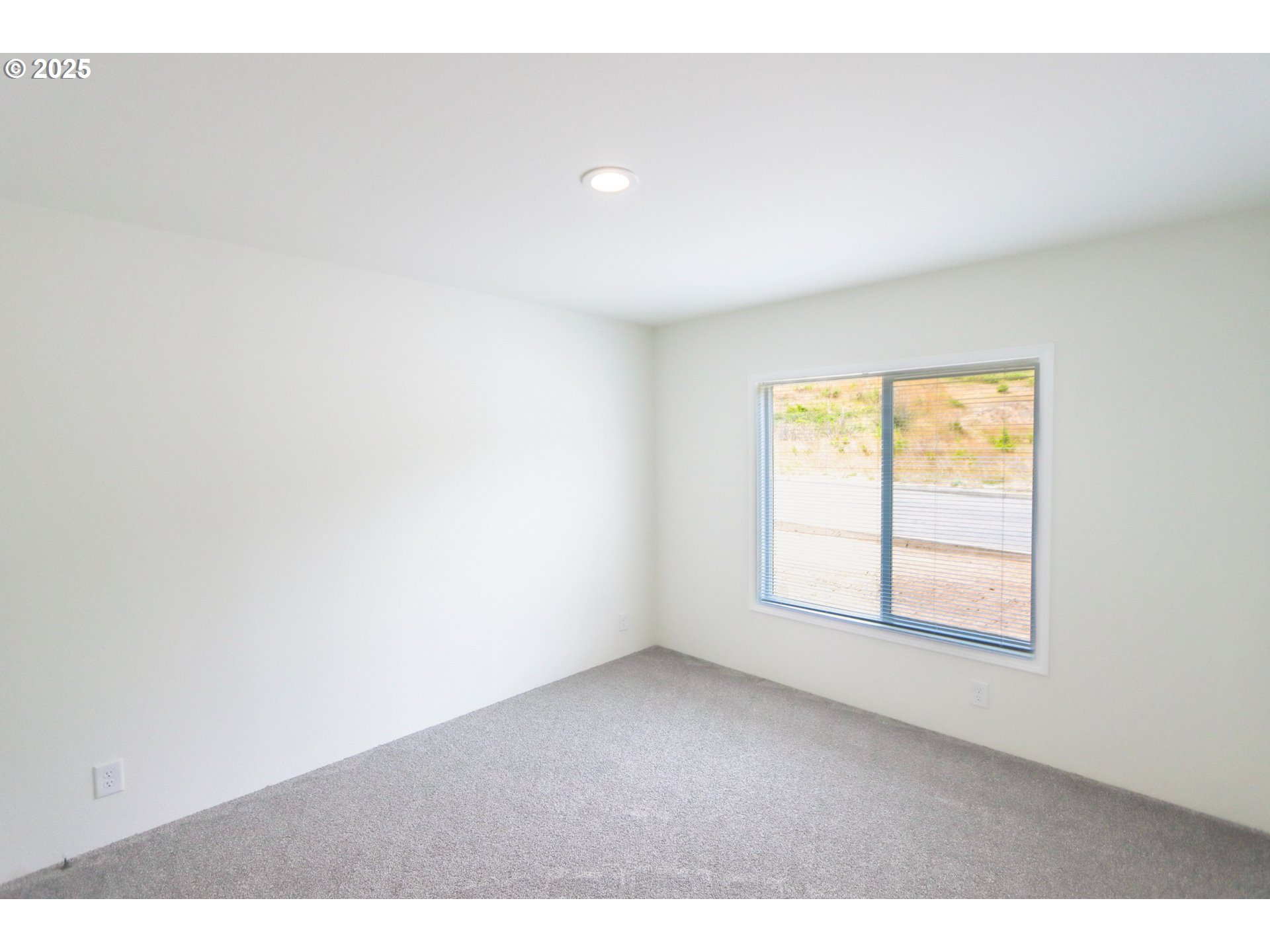 425 Providence Drive Reedsport, OR 97467 - Photo 16 of 33 an empty room with a window