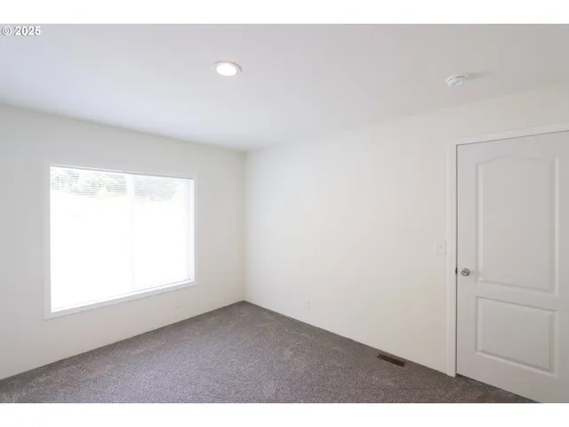 a bathroom with a sink toilet and vanity