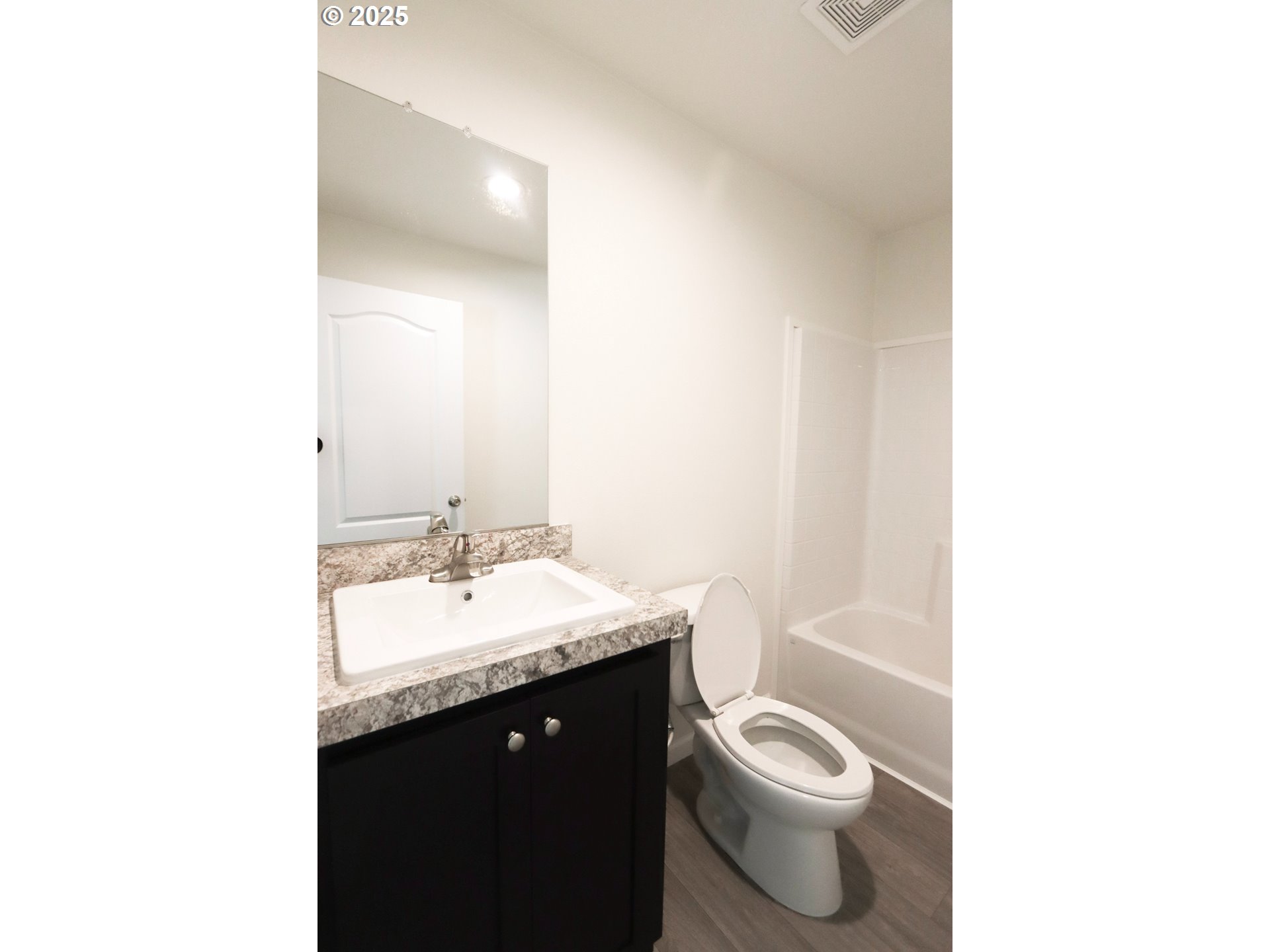 425 Providence Drive Reedsport, OR 97467 - Photo 19 of 33 a bathroom with a sink toilet and vanity
