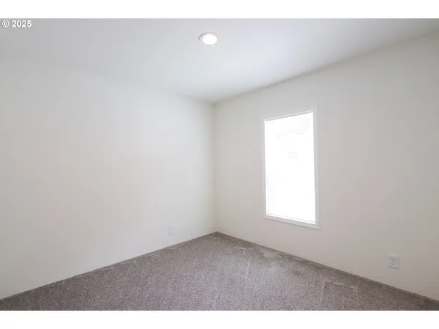 a big room with windows and closet