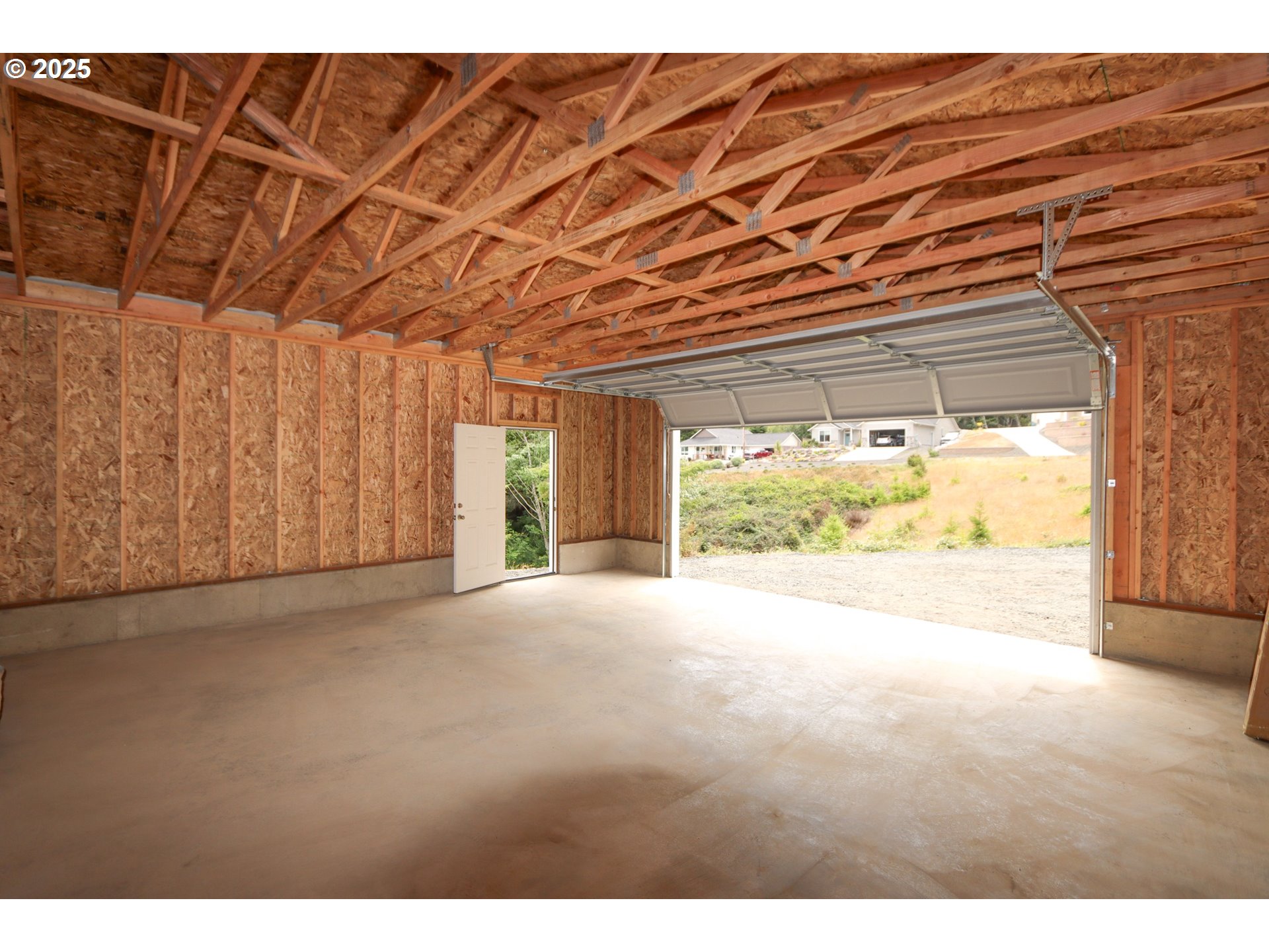 425 Providence Drive Reedsport, OR 97467 - Photo 24 of 33 a view of an empty room with a window