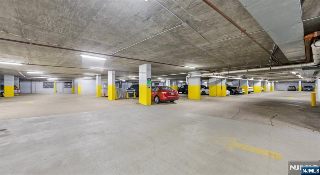 2050 North Central Road, Unit 710 Fort Lee, NJ 07024 - Photo 21 of 21 a view of the parking space with flat screen tv