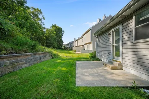 a view of a back yard of the house