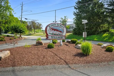 a sign on the side of a road