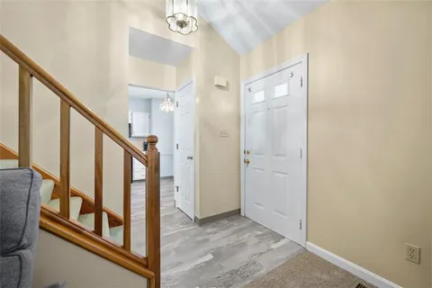 a view of an entryway with staircase