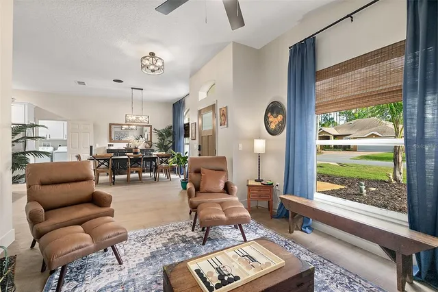 a living room with furniture and a rug