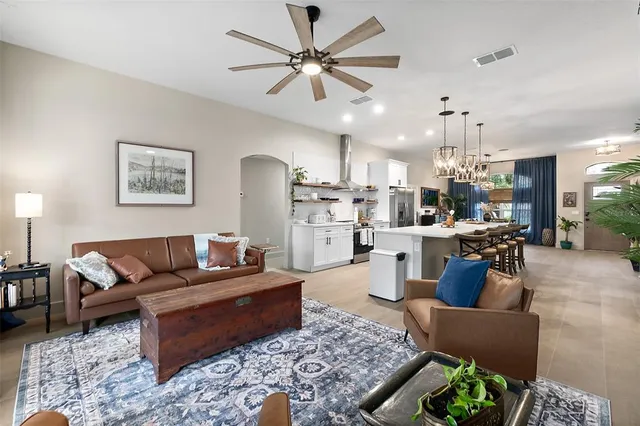 a bed room with a bed and a potted plant