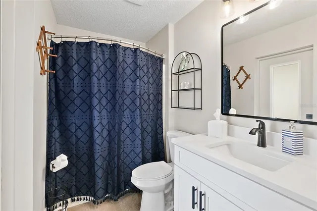 a view of storage and utility room with washer and dryer