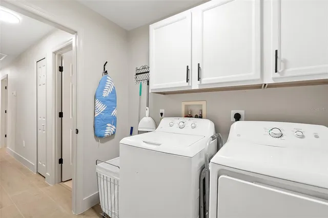 a view of a swimming pool with a lounge chairs