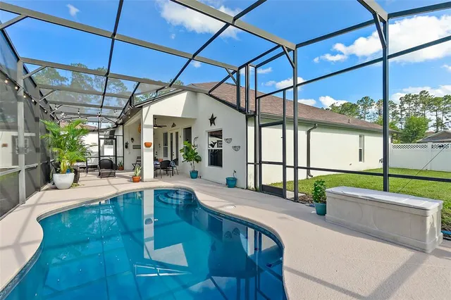 a view of a backyard with plants