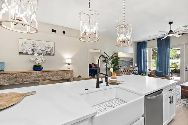 a very nice looking dining room with a table and chairs