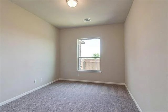20008 Navarre Terrace Pflugerville, TX 78660 - Photo 14 of 18 an empty room with a window