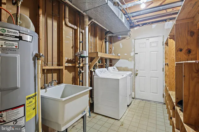 a bathroom with a sink and mirror