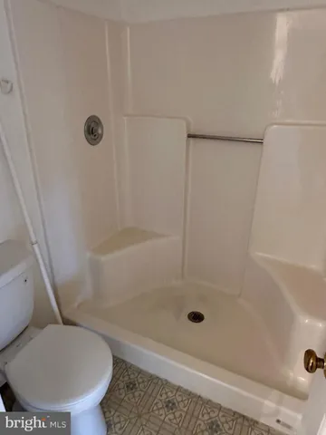 a bathroom with a toilet