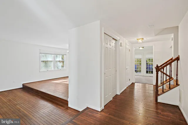 a view of entryway with wooden floor