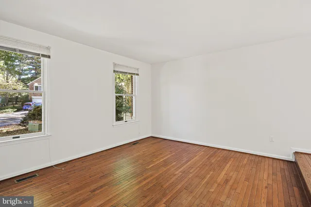 an empty room with windows