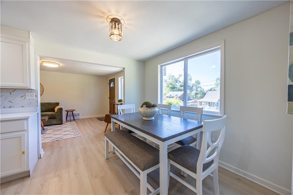 117 Oak Avenue Penn Hills, PA 15235 - Photo 7 of 26 a room with furniture and a window