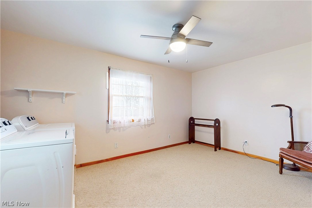 391 Canton Road Steubenville, OH 43953 - Photo 30 of 40 Laundry room featuring light carpet, washer and dryer, and ceiling fan