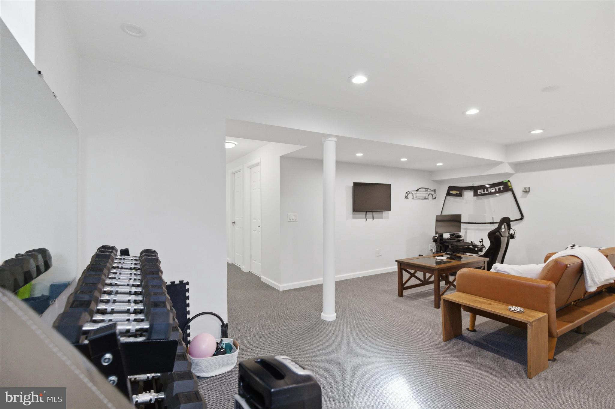 101 Cottage Grove Drive Pasadena, MD 21122 - Photo 23 of 35 a living room with furniture and a wooden floor