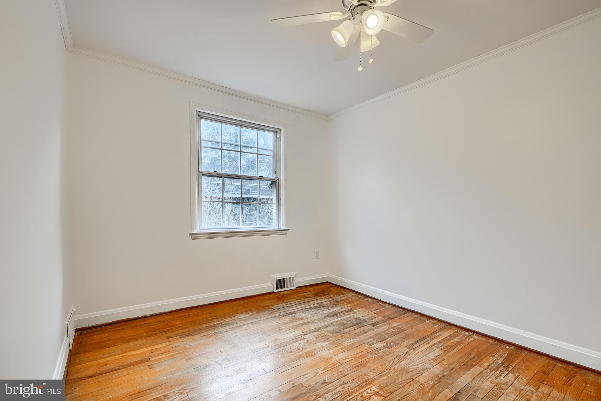 8235 Pleasant Plains Road Towson, MD 21286 - Photo 20 of 42 an empty room with a window