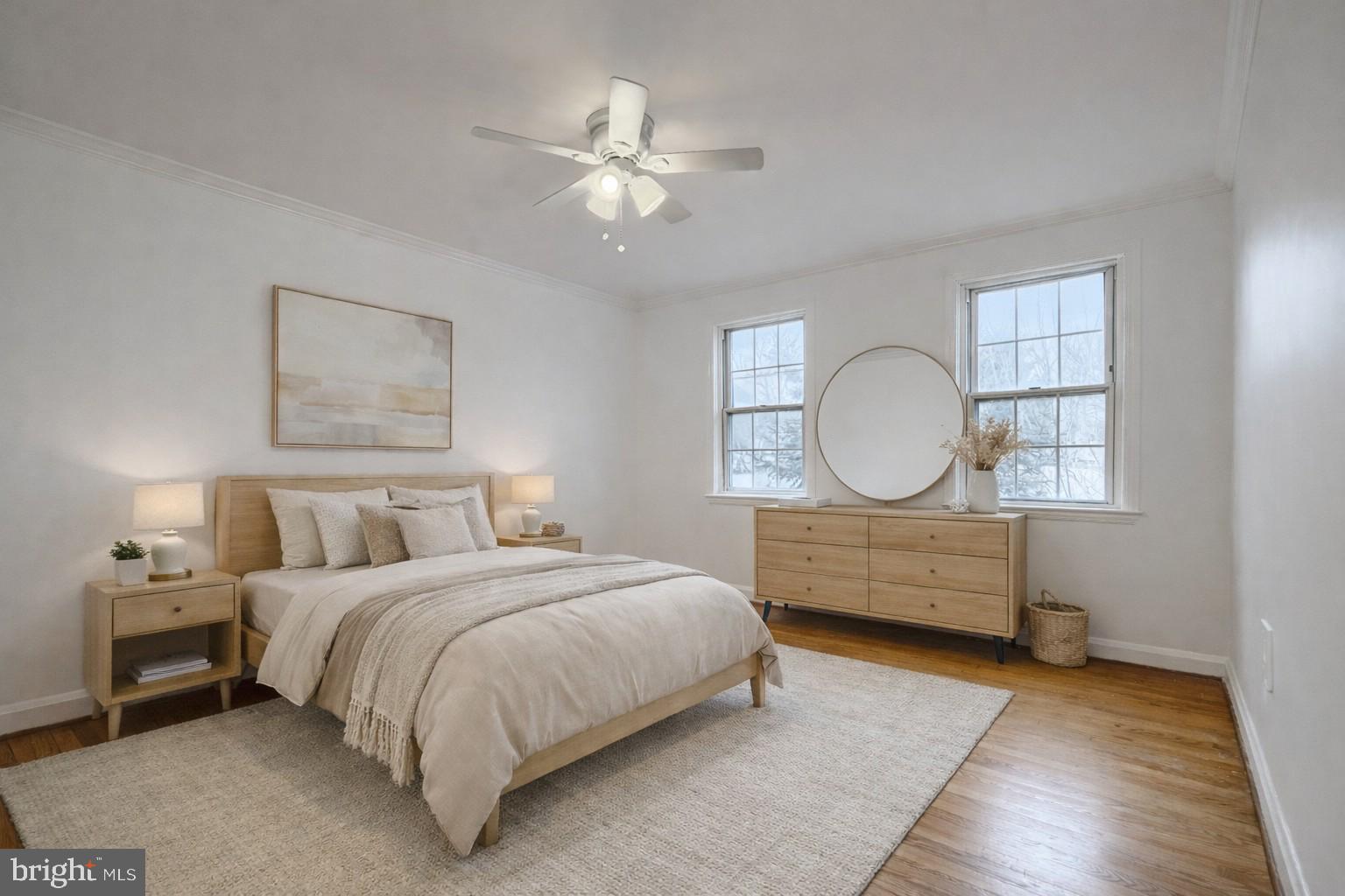 8235 Pleasant Plains Road Towson, MD 21286 - Photo 23 of 42 a bed room with a bed mirror and a window